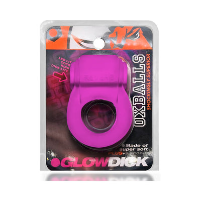 Purple Oxballs Glowdick LED-lit cockring in clear retail packaging with black and orange branding details.
