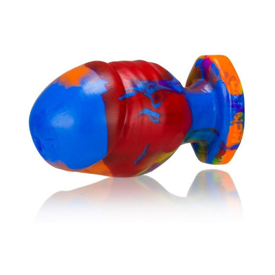 Medium-sized Oxballs Honcho-2 buttplug in vibrant rainbow colors with a textured, flared base design.
