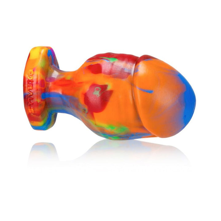 Large rainbow-colored silicone buttplug with a smooth, tapered shape and flared base for safe use.