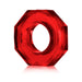 Red translucent octagonal cockring with a smooth inner circle and embossed branding detail.