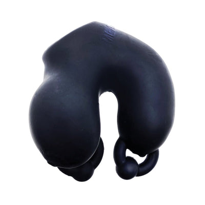 Black full-cover flexible chastity device made from soft silicone with integrated rings for secure fit.