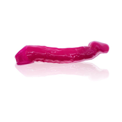 Bright pink flexible cocksheath with a textured, muscular design and a smooth reflective surface.
