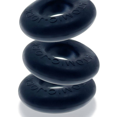 Three black silicone cock rings stacked vertically with a smooth matte finish and embossed branding.