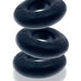 Three black silicone cock rings stacked vertically with a smooth matte finish and embossed branding.