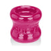 Bright pink flexible ball stretcher with a smooth, rounded shape and embossed "SQUEEZE" branding.