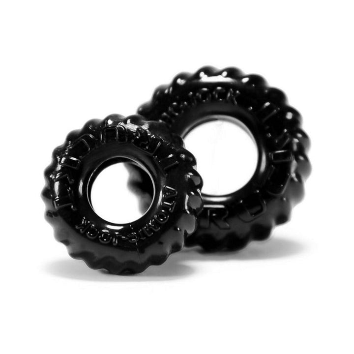 Two black textured cockrings made from flexible Skinflex-TPR material, designed for comfort and support.