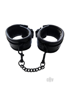Black padded leather wrist cuffs with soft lining and detachable chain connectors, featuring lockable buckle closures.