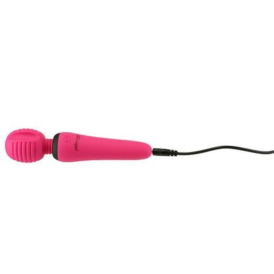 Fuchsia rechargeable silicone mini wand massager with textured head and USB charging cable connected.