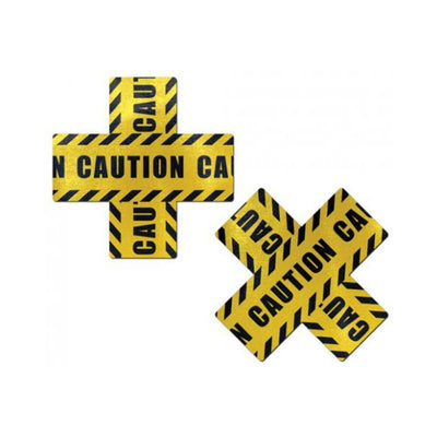 Pair of yellow crossed caution tape nipple pasties with black diagonal stripes and bold "CAUTION" text.