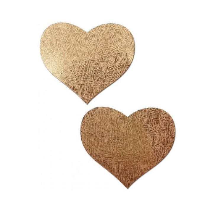 Pair of rose gold heart-shaped nipple pasties with a textured, metallic finish on a white background.