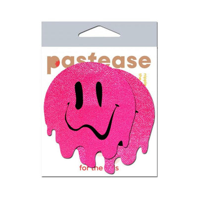 Neon pink pastease with melting smiley face design on retail card packaging.