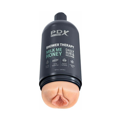 Discreet PDX Plus Shower Therapy Milk Me Honey Light stroker designed as a shampoo bottle with realistic sleeve and suction cup.