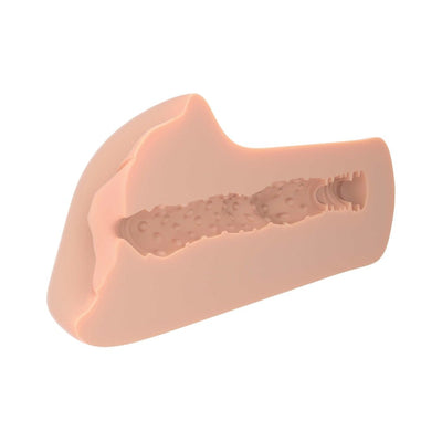 Cross-section view of the PDX Plus XTC Stroker Light showing textured internal tunnel design in soft flesh tone material.