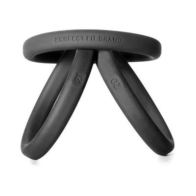 Set of three black silicone rings in sizes 20, 21, and 22 with soft-touch finish and brand engraving.