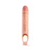 Vanilla-colored 10-inch realistic textured penis extender sheath with ball strap opening on white background