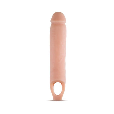 Vanilla-colored 11.5 inch soft penis sheath extender with textured design and ball strap opening.