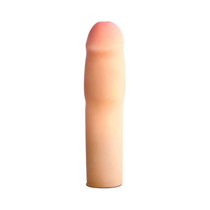Blush Performance Cock Xtender in flesh tone with realistic texture and smooth finish on white background