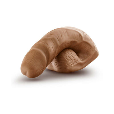Vanilla beige 5-inch realistic packer dildo with natural texture and subtle detailing for gender expression.