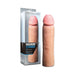 Beige realistic penis extension sleeve with packaging labeled Performance Magnum Xtender for added length and girth.