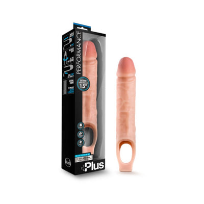 Vanilla-colored 10 inch silicone penis extender sheath with ball strap, shown with packaging box.
