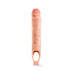 Vanilla-colored 11.5 inch silicone penis extender sheath with ball strap opening on white background.