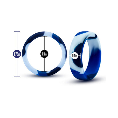 Blue and white silicone camo cock ring shown with dimensions for diameter and thickness.