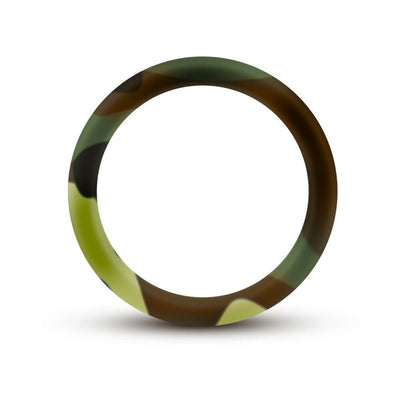 Silicone cock ring with green and brown camouflage pattern on a white background.