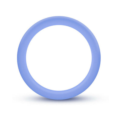Blue silicone glow-in-the-dark cock ring with smooth, stretchy design for comfort and durability.