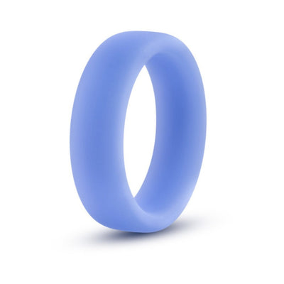 Blue silicone glow-in-the-dark cock ring with a smooth, stretchy, flat design.