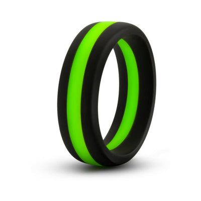 Black silicone ring with a bright green stripe, smooth finish, designed for comfortable wear.