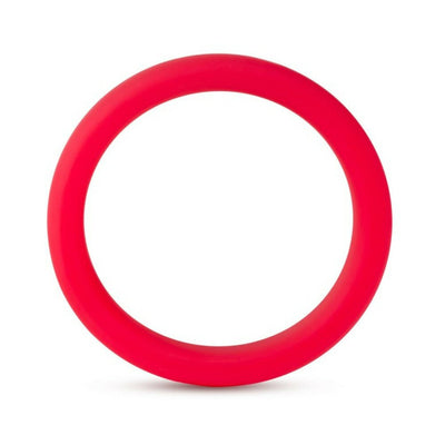 Red silicone cock ring with smooth finish and flexible design for comfortable fit and secure wear.