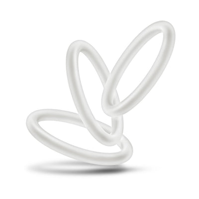 Three medium-sized translucent silicone cock rings floating on a white background with soft shadows.