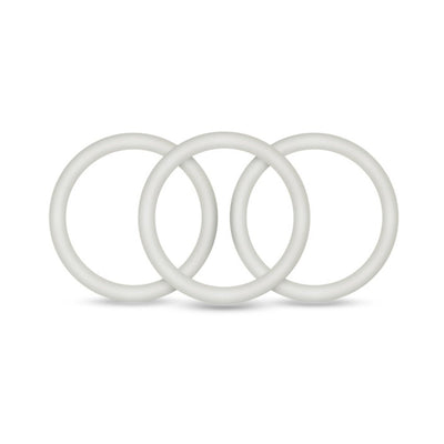Set of three medium-sized pure white silicone cock rings arranged side by side on a white background.