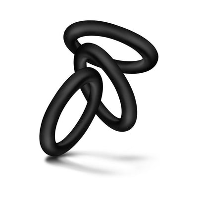 Three black premium silicone rings arranged in a floating, intertwined display on a white background.