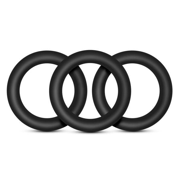 Three black stretchy silicone cock rings displayed on a white background.