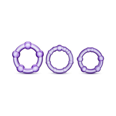Three purple beaded stretchy rings in small, medium, and large sizes for intimate use.