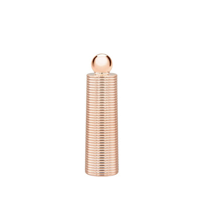 Rose gold textured mini massager with a smooth rounded tip, standing upright on a white background.