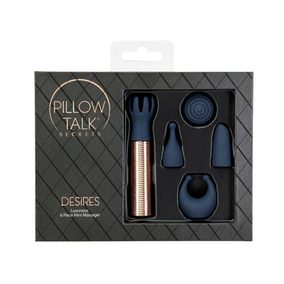 Pillow Talk Secrets Desires 6-piece navy silicone mini massager set with rose gold bullet and five interchangeable heads in black packaging.