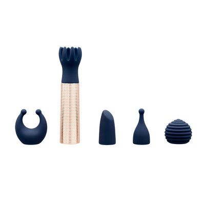 Navy blue 6-piece silicone mini massager set with rose gold bullet vibrator and five interchangeable textured heads.