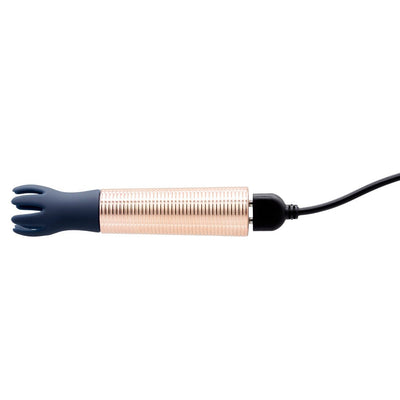 Navy silicone tickler head attached to rose gold mini massager with USB charging cable connected.