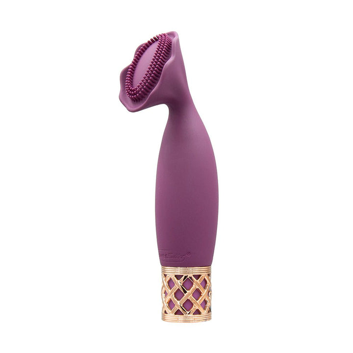 Compact purple silicone clitoral vibrator with textured flower-shaped head and rose gold lattice base.