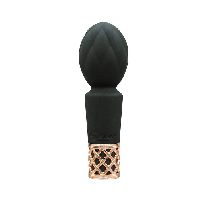 Compact black silicone clitoral vibrator wand with quilted head and rose gold lattice base detail.
