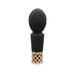 Compact black silicone clitoral vibrator wand with quilted head and rose gold lattice base detail.