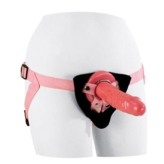 Pink adjustable harness with 7.5 inch realistic dong on white mannequin hips.