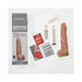 Beige realistic dildo with suction cup, syringe, tropical-flavored liquid, Vac-U-Lock powder, care guide, and packaging box.