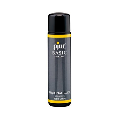 100 ml bottle of Pjur Basic Silicone Personal Lubricant with black and yellow label, made in Germany.