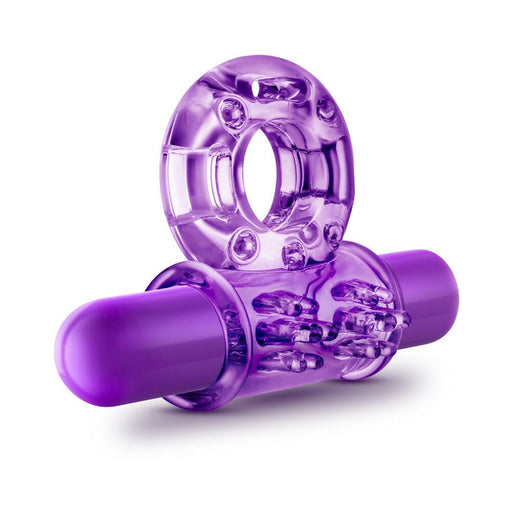 Purple translucent vibrating cockring with textured surface and compact bullet vibrator insert.