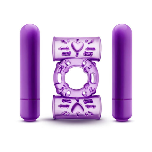 Purple dual vibrating cock ring with two removable bullet vibrators and textured silicone design.