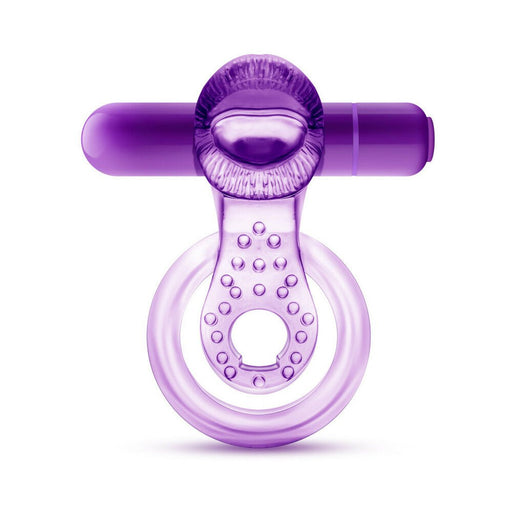 Purple double strap vibrating cock ring with textured tongue-shaped stimulator and bullet vibrator.