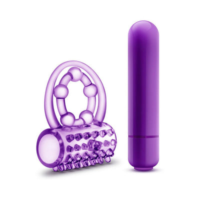Purple double strap vibrating cock ring with textured sleeve and detachable bullet vibrator.